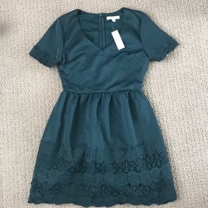 Francesca’s forest green dress